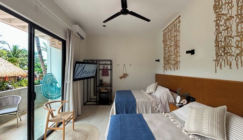 Habitación Confort doble, vistas parciales al mar