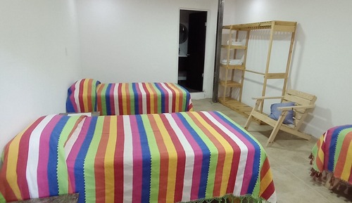 Habitación triple, vistas al jardín