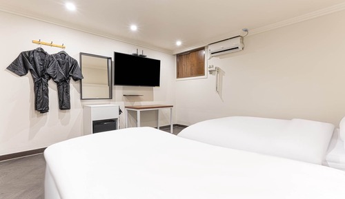 Habitación con 2 camas individuales