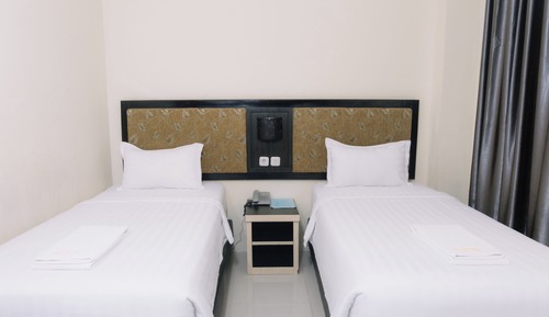 Habitación superior con 1 cama doble o 2 individuales, vistas a la ciudad
