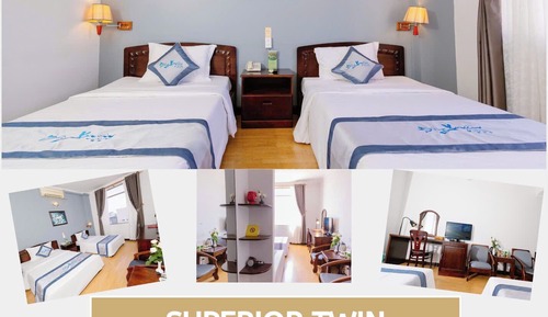 Habitación superior con 2 camas individuales, vistas a la ciudad