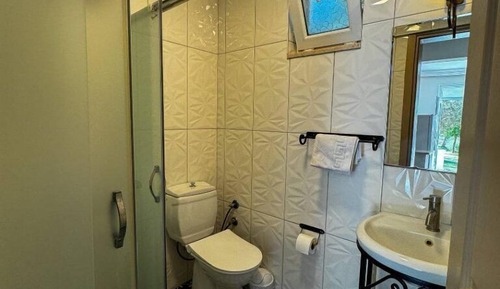 Habitación triple, balcón, vistas al jardín