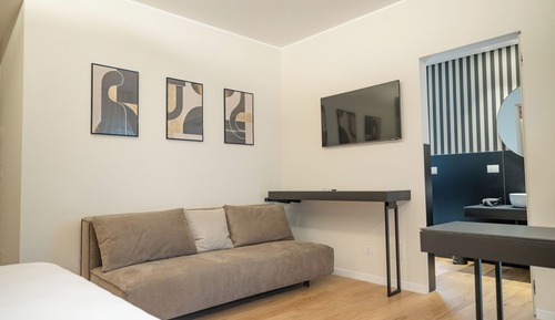 Habitación triple familiar, vistas al patio