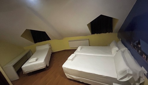Habitación familiar, varias camas