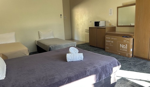 Habitación cuádruple estándar, balcón, vistas al jardín