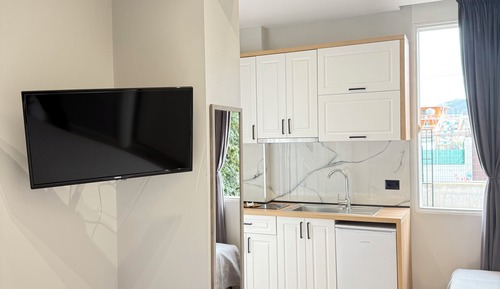 Habitación triple exclusiva, planta baja