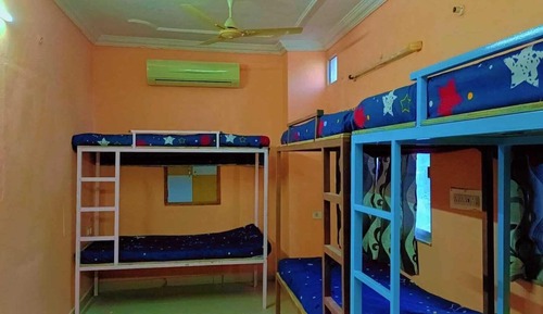 Dormitorio compartido clásico