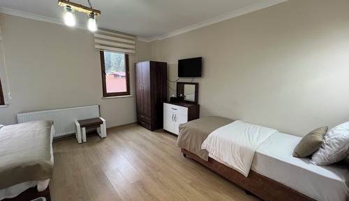 Habitación triple estándar, vistas al jardín
