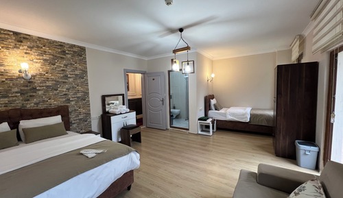 Habitación cuádruple Deluxe, balcón, vistas a la montaña