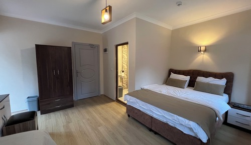Habitación triple Deluxe, balcón, vistas al jardín