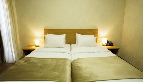 Habitación estándar con 1 cama doble o 2 individuales
