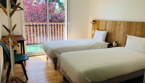 Habitación con 2 camas individuales