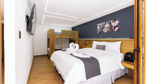 Habitación cuádruple familiar, vistas al jardín