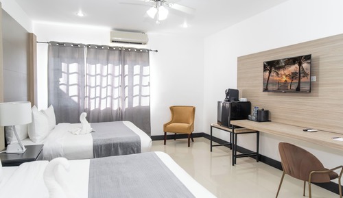 Habitación estándar con 1 cama doble o 2 individuales, vistas a la ciudad