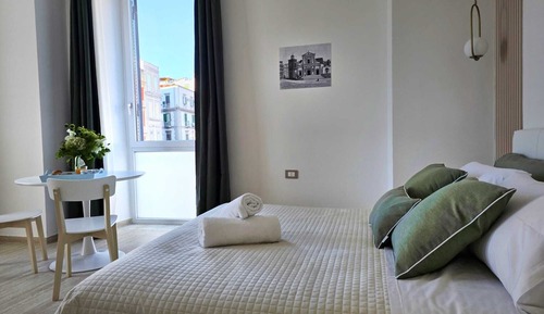 Habitación triple exclusiva, vistas parciales al mar