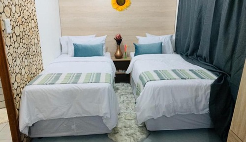 Habitación triple, vistas al jardín