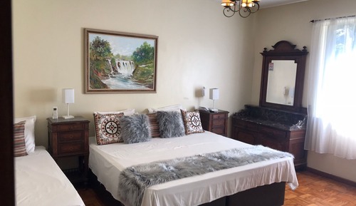 Habitación cuádruple Deluxe, vistas al jardín