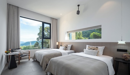 Habitación básica con 2 camas individuales
