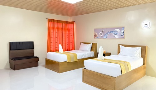 Habitación con 2 camas individuales, vistas al jardín