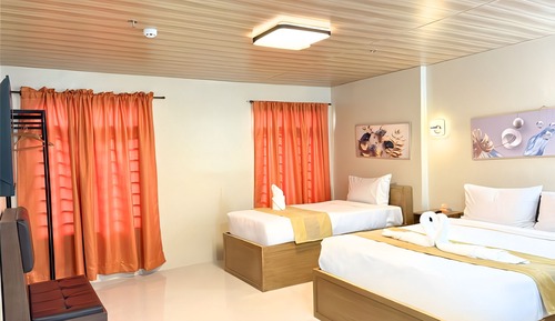 Habitación triple, vistas al jardín