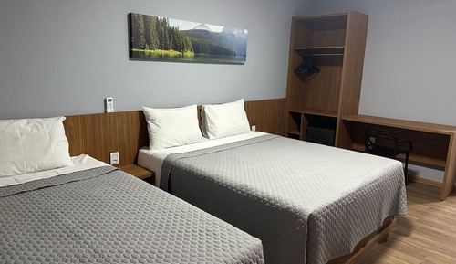Habitación Confort con 1 cama doble o 2 individuales