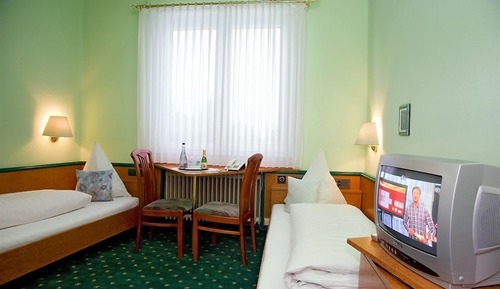 Habitación Confort con 1 cama doble o 2 individuales, vistas a la ciudad