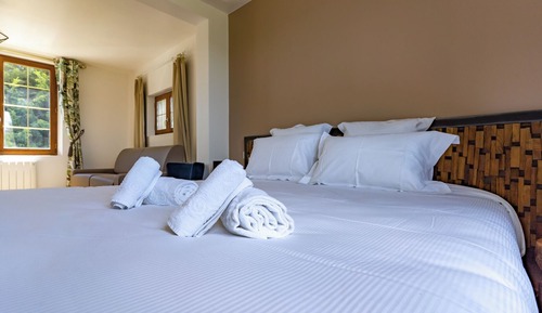 Habitación cuádruple Confort, en la zona del jardín