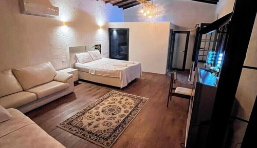 Habitación triple, vistas al jardín