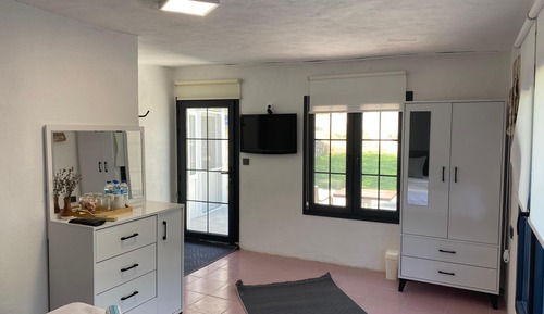 Habitación con 2 camas individuales, vistas al jardín