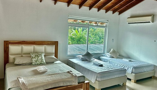 Habitación cuádruple superior, vistas al jardín