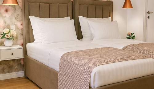 Habitación Deluxe con 2 camas individuales, balcón, vistas a la ciudad