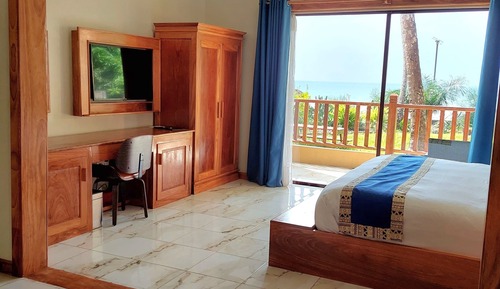 Habitación superior, vistas a la playa
