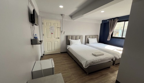 Habitación con 2 camas individuales