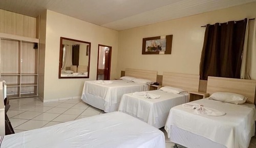 Habitación cuádruple, varias camas