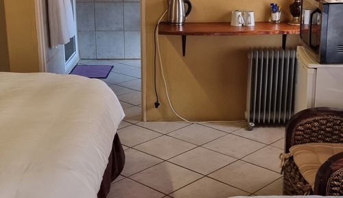 Comfort Quadruple Room, Garden View