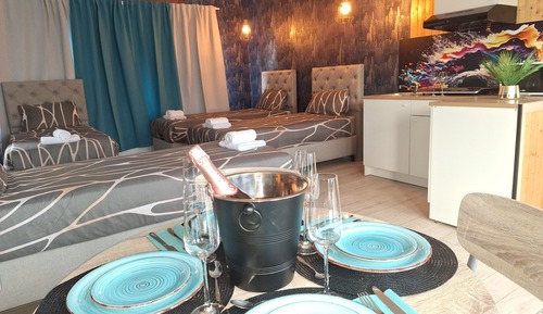 Habitación cuádruple Deluxe, vistas al jardín