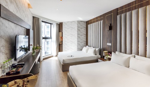 Habitación Business cuádruple, vistas al jardín