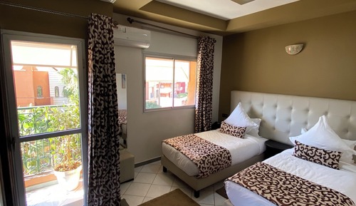 Habitación Confort doble, varias camas