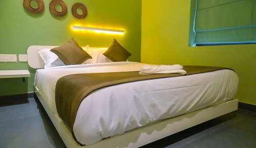 Habitación familiar con 2 camas individuales, 2 camas de matrimonio, vistas al jardín