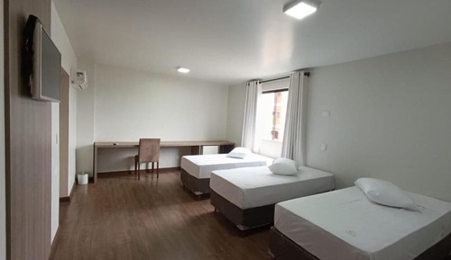 Habitación triple de lujo