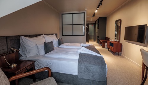 Habitación superior con 1 cama doble o 2 individuales