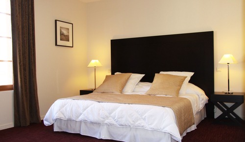 Habitación superior con 1 cama doble o 2 individuales