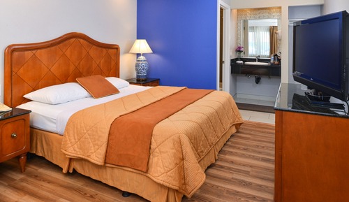 Habitación Signature, 1 cama de matrimonio grande, frigorífico y microondas
