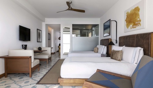 Habitación Deluxe, 2 camas de matrimonio, vistas parciales al mar