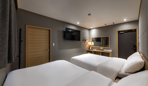 Habitación familiar con 2 camas individuales