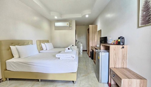 Habitación con 2 camas individuales, vistas al jardín