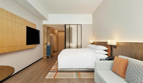 Habitación superior, 1 cama de matrimonio grande con sofá cama, vistas a la ciudad