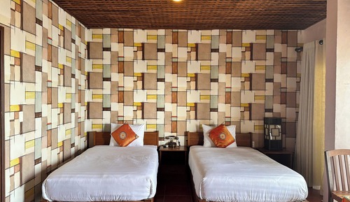 Habitación básica con 2 camas individuales