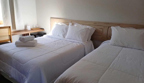 Habitación triple familiar, varias camas
