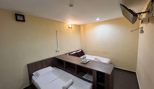 Habitación triple Deluxe